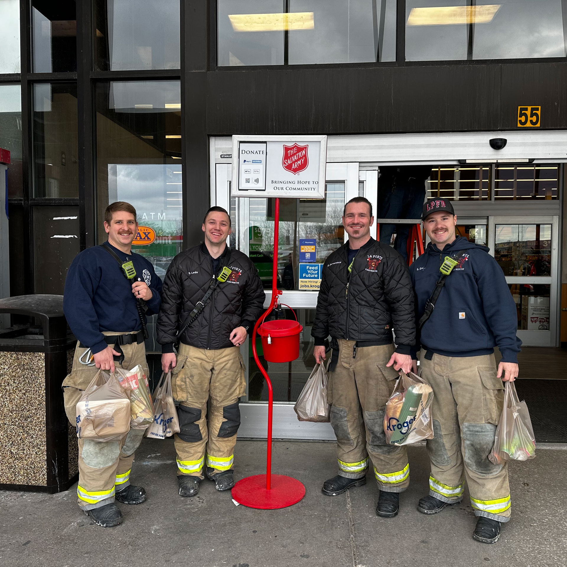 Fire Department donating to The Salvation Army
